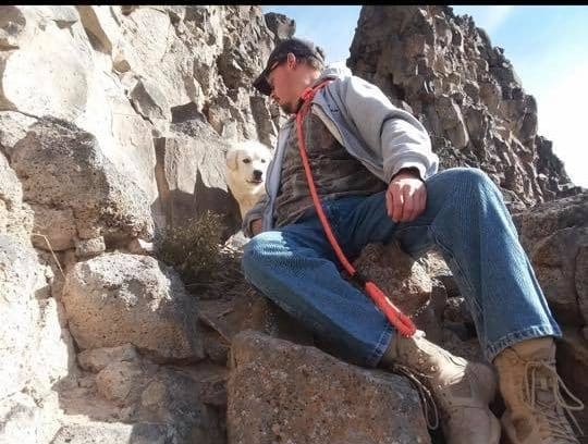 dog trapped in a cliff
